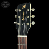 Headstock of Rock N Roll Relics Revenge Jr White W/Black Polka Dots Relic.