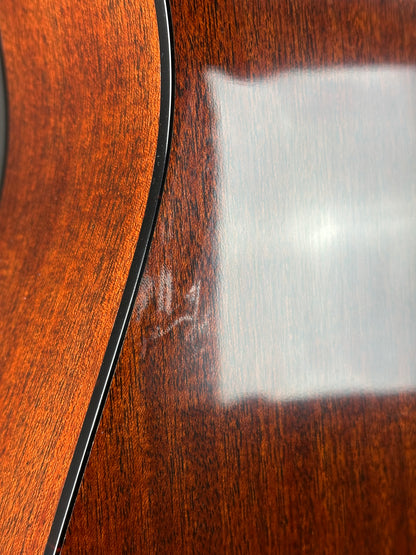 Close-up of a wooden surface with a white rectangular object on top