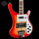 Electric guitar with a red and white design on a black background