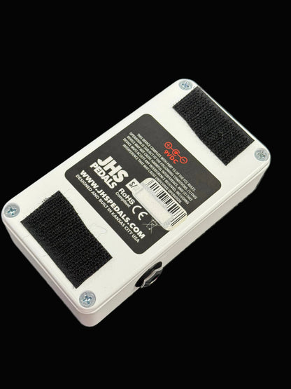 JHS Pedals guitar effects pedal on a wooden surface