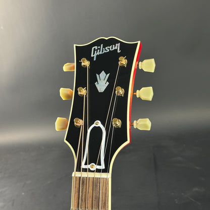 Gibson guitar headstock on a dark background