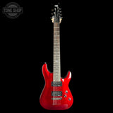 A red electric guitar with a glossy red finish, dark fretboard, and black hardware, shown against a solid black background. A 'TONE SHOP' watermark is visible in the top-left corner.