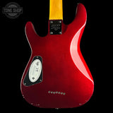 The back of a red electric guitar with a yellow maple neck, featuring a glossy red body, a black pickguard, and a silver 'sip 25' badge, shown against a black background.