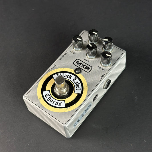 Guitar effects pedal with 'Black Label Chorus' on a dark background
