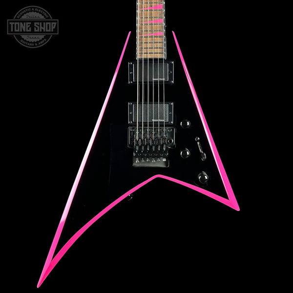 Black electric guitar with pink accents on a black background, featuring the Tone Shop logo.