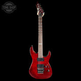 Red electric guitar on a black background with 'Tone Shop' logo.
