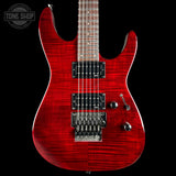 Red electric guitar with a black background