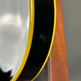 Scratches on side of Used 2016 Epiphone Les Paul Custom Ebony Left Handed.