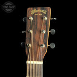 Guitar headstock with 'Martin & Co' branding on a black background