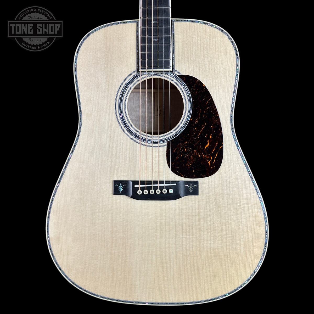 Front of Martin Custom Shop  42 Style Torch Motif Adirondack/Master Grade Quilt Maple.