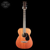 Acoustic guitar on a black background with 'Tone Shop' logo.