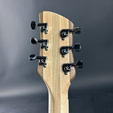 Guitar headstock with tuning pegs on a gray background