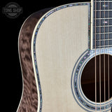 Front detail of Martin Custom Shop  42 Style Torch Motif Adirondack/Master Grade Quilt Maple.