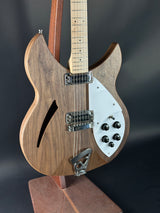 Wooden electric guitar with a dark background