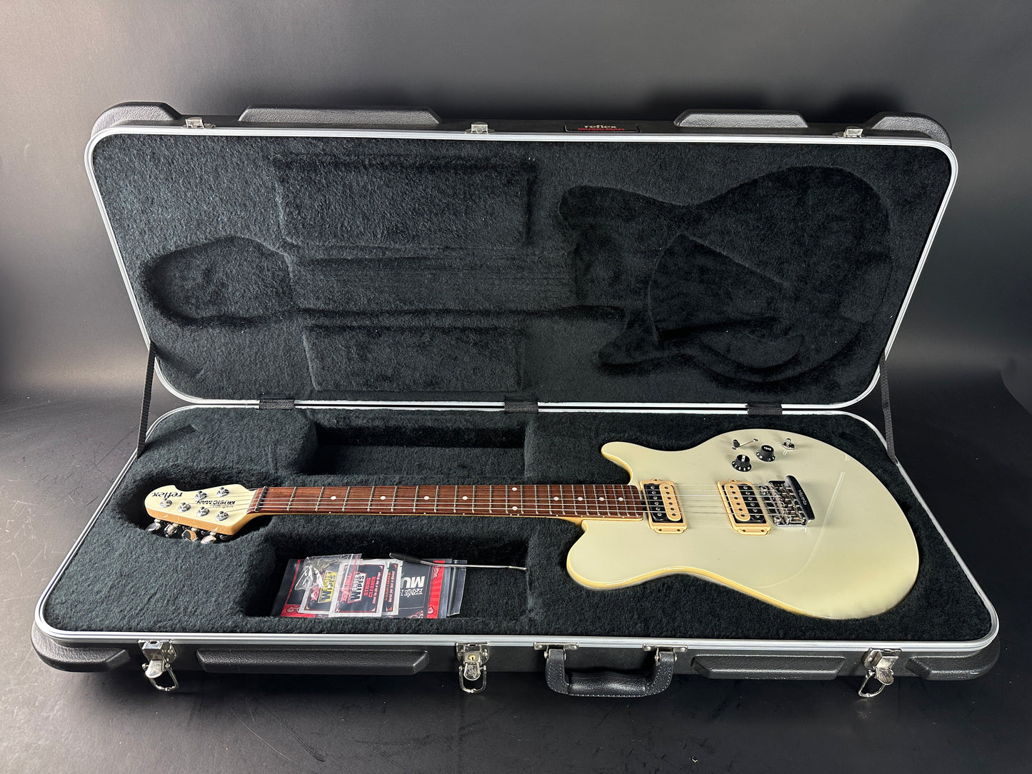 Used Ernie Ball Music Man Reflex White in case.
