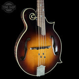Folk mandolin with a dark brown finish on a black background, featuring the Tone Shop logo.