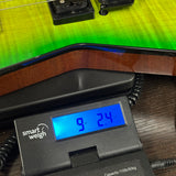 Dean USA ML Floyd Flame Top Slime on scale displaying weight.
