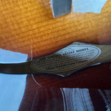 Gibson Artist Model guitar label on a guitar body