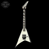 White electric guitar with a black 'Tone Shop' logo in the corner