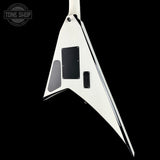 White guitar body with black pickguard on a black background, featuring 'Tone Shop' logo.