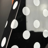 Close-up of a black and white polka dot pattern