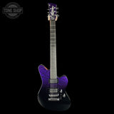Purple electric guitar on a black background with 'Tone Shop' logo.