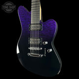 Purple electric guitar on a black background with 'Tone Shop' logo.