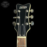 Gretsch guitar headstock on a black background