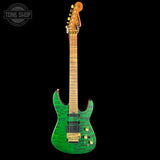 Green electric guitar with a black background