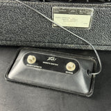 Peavey Remote Switch footswitch for the Vox Special 120 amplifier, featuring two toggle switches on a black faceplate with a protective cover, shown in front of the amplifier.