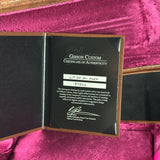 Gibson Custom Certificate of Authenticity on a pink velvet background