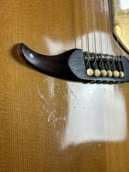 Wear below bridge of Vintage 1963 Fender King.