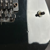 Wear on body of Used ESP LTD MIJ Black.