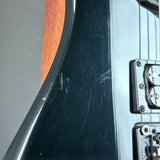 Wear on body of Used ESP LTD MIJ Black.