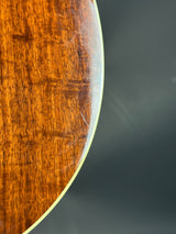 Close-up of a wooden surface with a dark background