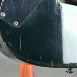 Wear on back of Used ESP LTD MIJ Black.