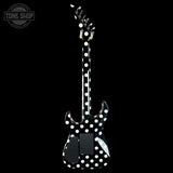 A black electric guitar with a white polka-dot pattern, shown from the back against a solid black background. A Tone Shop watermark is visible in the top-left corner.