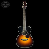 Full front of Collings OM2 A HC Hill Country Sunburst Adirondack.
