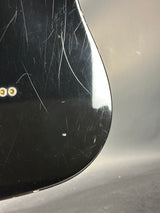 Scratched black surface with a metallic edge