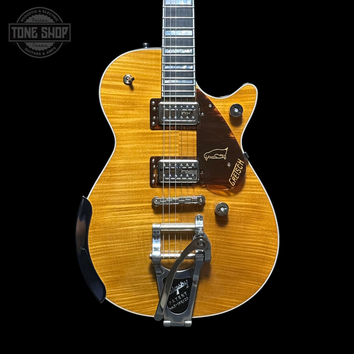 Front of Used 2024 Gretsch G6134TFM-NH Nigel "Droff" Hendroff Signature Penguin Amber Flame.