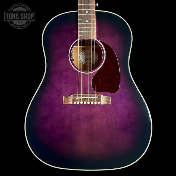 An acoustic guitar with a purple-to-black sunburst finish, shown from the front against a black background. A Tone Shop watermark is visible in the top-left corner.