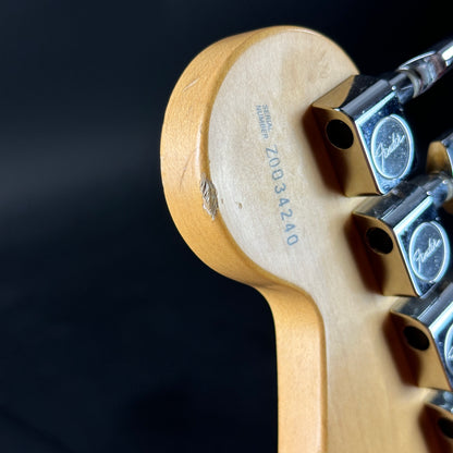 Wear on headstock of Used 2000 Fender American Standard Stratocaster Sunburst.