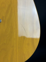 Close-up of a wooden surface with a dark background