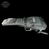 Gray guitar case with a brand logo on a black background