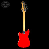 Red electric guitar with a black background, featuring the Tone Shop logo.