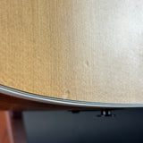Wear on body of Used Taylor 210ce.