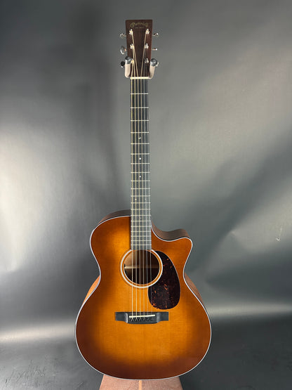 Acoustic guitar on a gray background