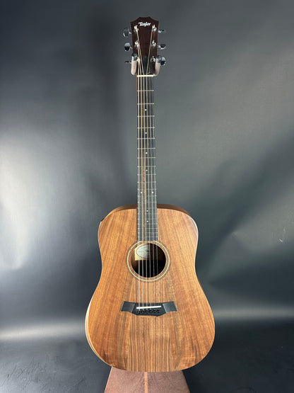 Acoustic guitar on a gray background