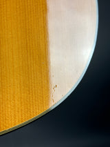 Close-up of a wooden surface with a dark background