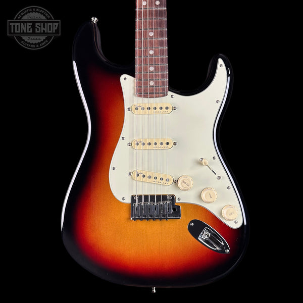 Electric guitar with a sunburst finish on a black background, featuring the Tone Shop logo.